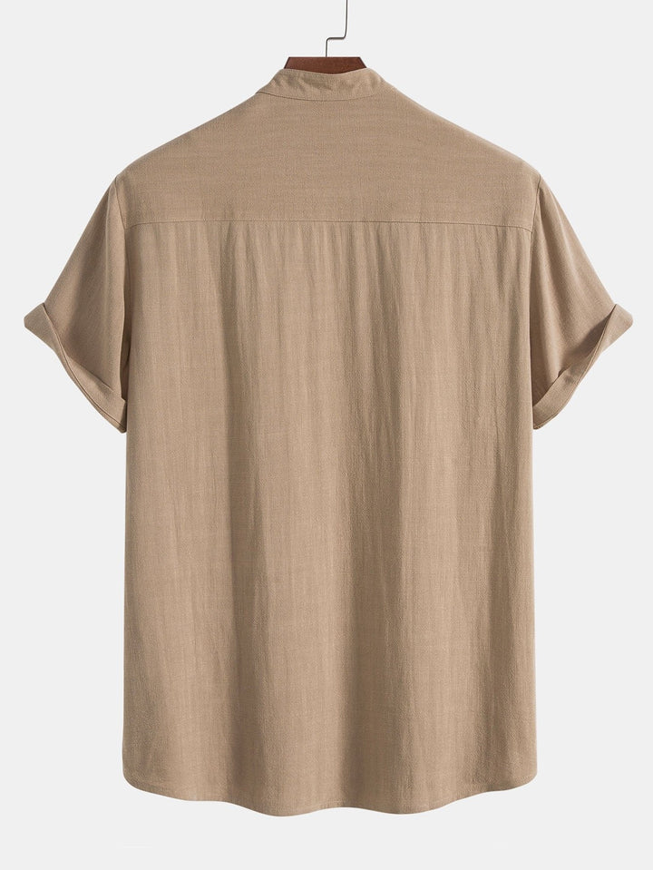 Comfortable men's casual wear set. Summer outfit with stand collar, button-up shirt & relaxed fit pants.