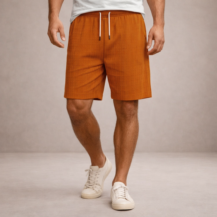 Lightweight men's summer casual shorts, knee-length, ideal for warm weather & relaxed style.