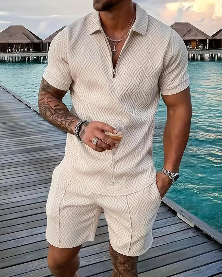 Stylish men's summer tracksuit with a modern zip collar polo top and comfortable matching shorts.