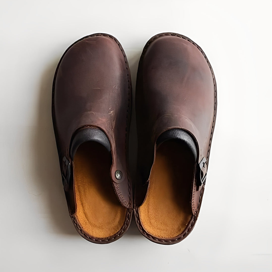 Lightweight men's house slippers with removable insole, offering comfort footwear for indoor wear.