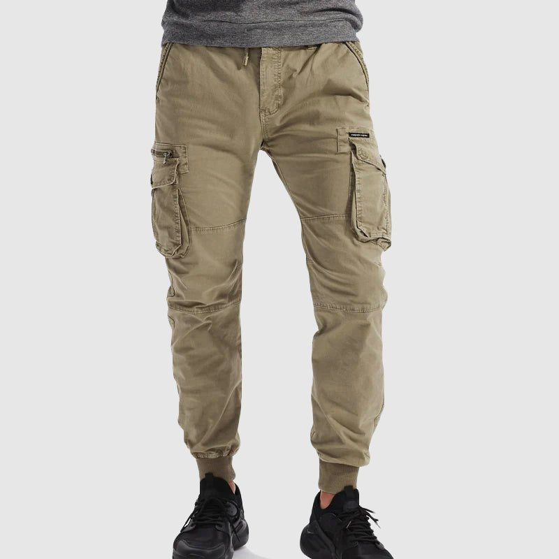 Comfortable men's cargo jogger pants with multiple utility pockets for essentials. Ideal for active wear & style.