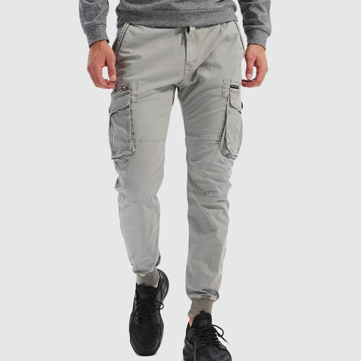 Practical men's tactical cargo pants, elastic waist & cuffs. Great for jogging, outdoor adventures, or daily comfort.