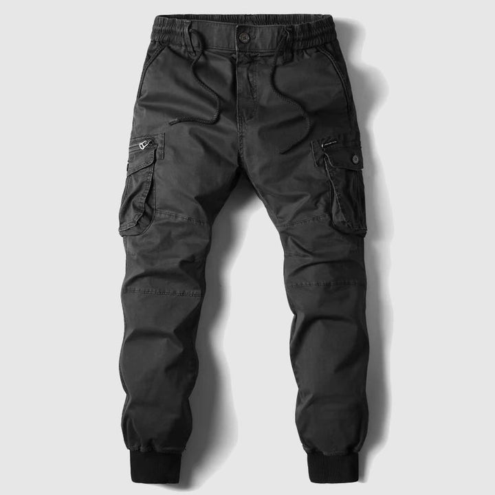 Rugged men's utility joggers, ideal for hiking or casual wear. Features multiple pockets & comfortable athletic fit.