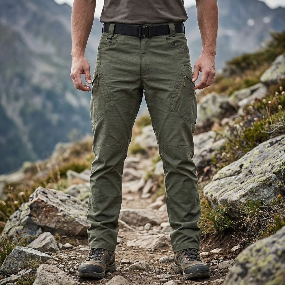 Men's tactical cargo pants, durable, with 9 functional pockets for utility & outdoor adventure.