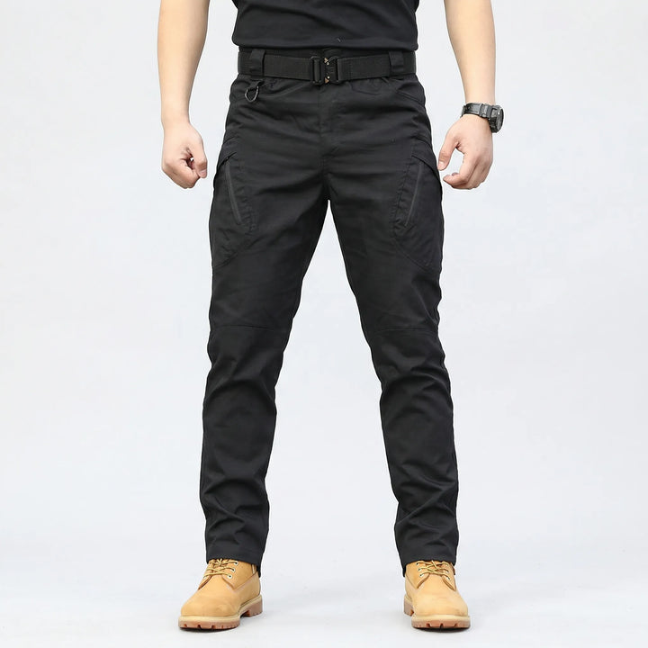 Versatile men's utility cargo pants, 9 pockets, durable & stretchable for tactical, work & outdoor use.