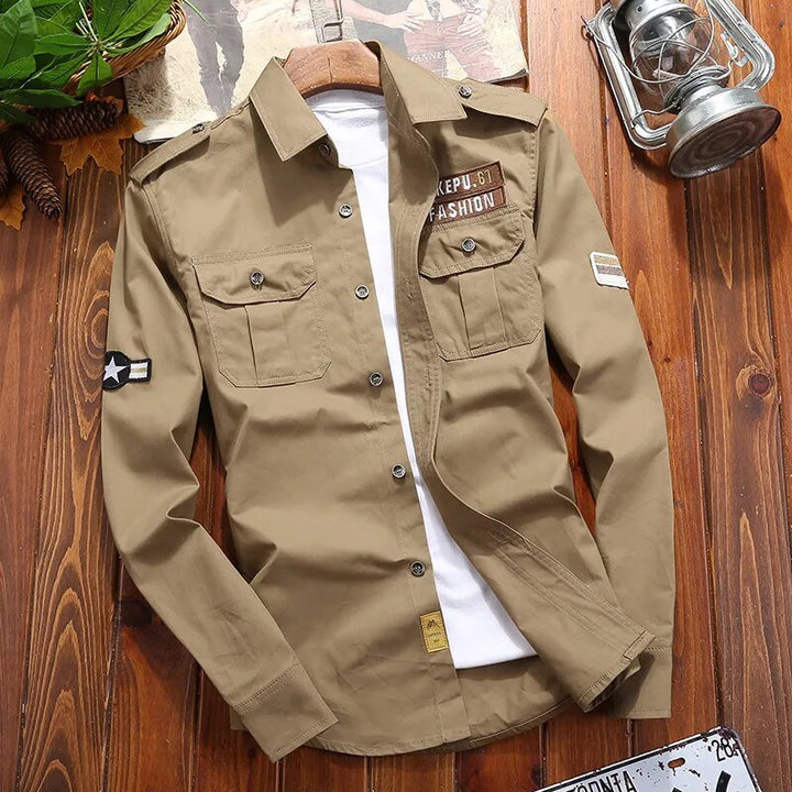 Rugged men's long sleeve button-down tactical shirt. Ideal for outdoor activities, with utility pockets & epaulettes.