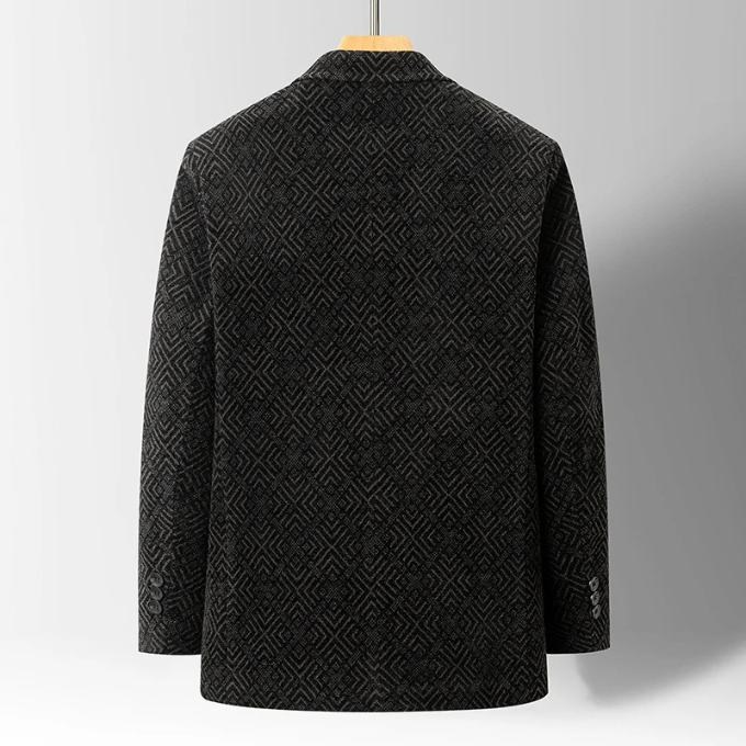 Close-up of a men's sophisticated wool blend blazer coat, highlighting the stand collar & fabric