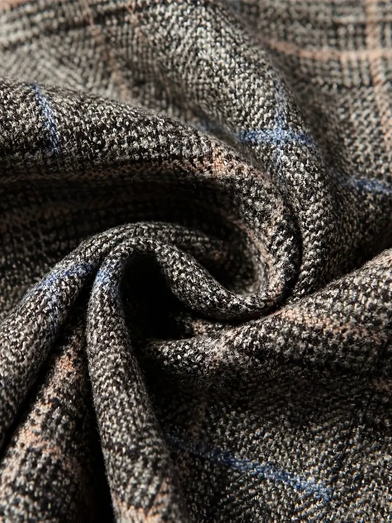 Elegant men's tailored blazer with a modern checked pattern, offering a sophisticated look for men's fashion.