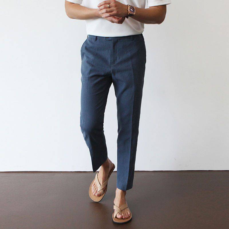 Back view of men's tailored fit summer pants, highlighting sleek design and comfortable, breathable fabric for spring.