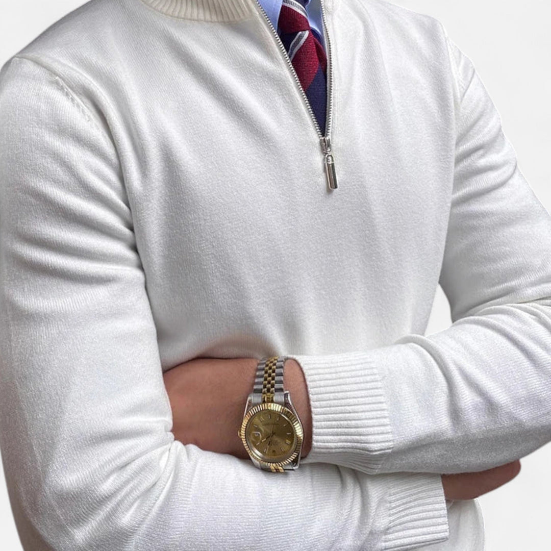 Close-up of a men's half-zip sweater collar, showcasing quality fabric and smart casual design.
