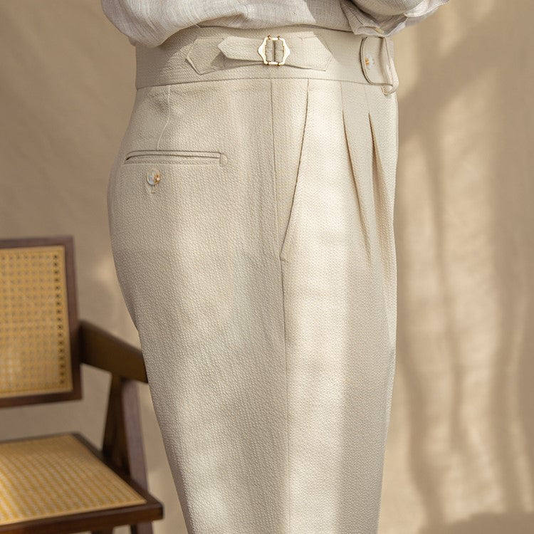 Versatile men's tailored high-waist pleated trousers, suitable for formal & smart casual outfits.