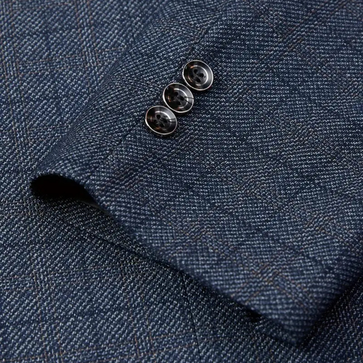 High-quality men's tailored plaid blazer. This check jacket offers a sophisticated and smart look for any occasion.
