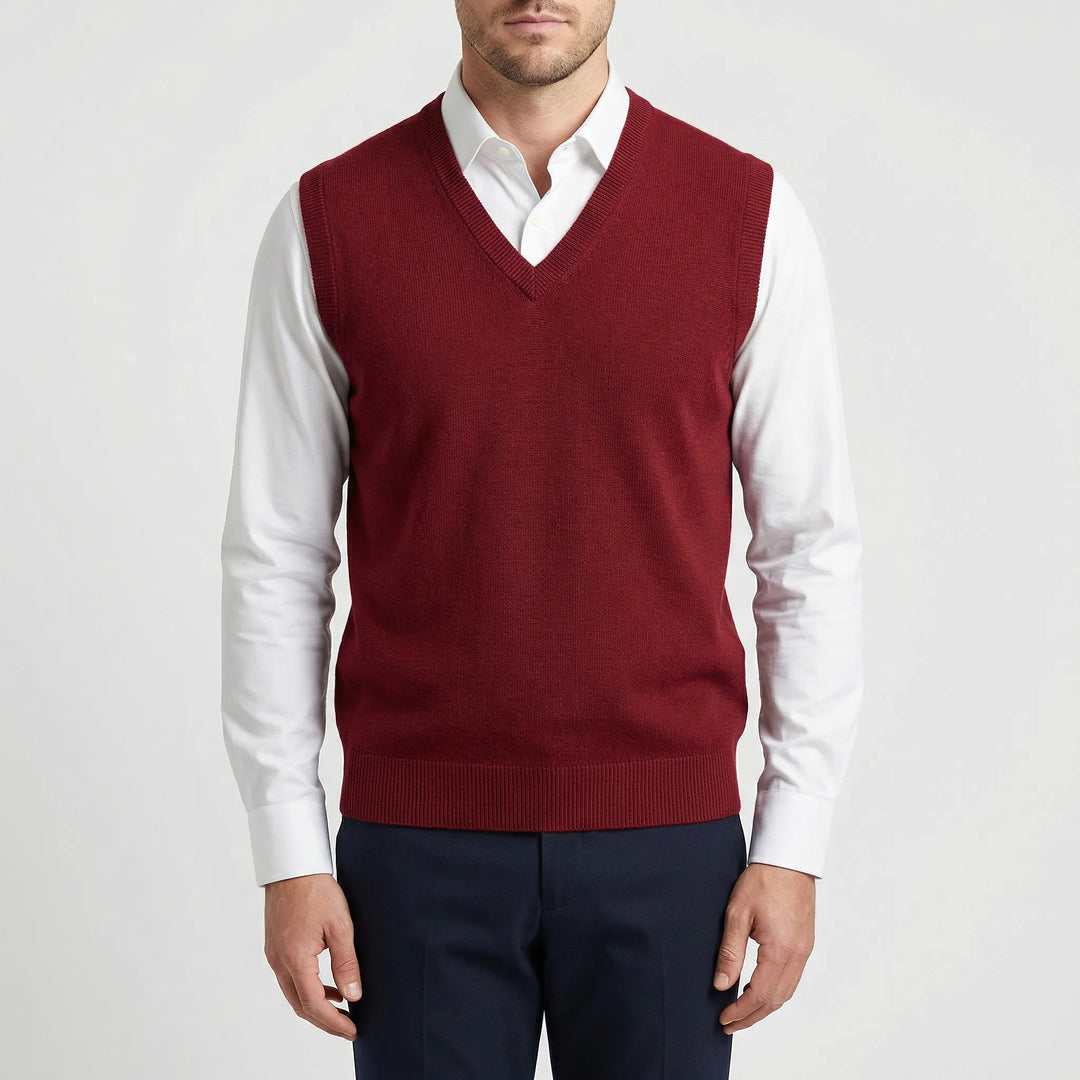 Man wearing a stylish Teo sleeveless V-neck vest, showcasing its classic fit and versatile menswear appeal.