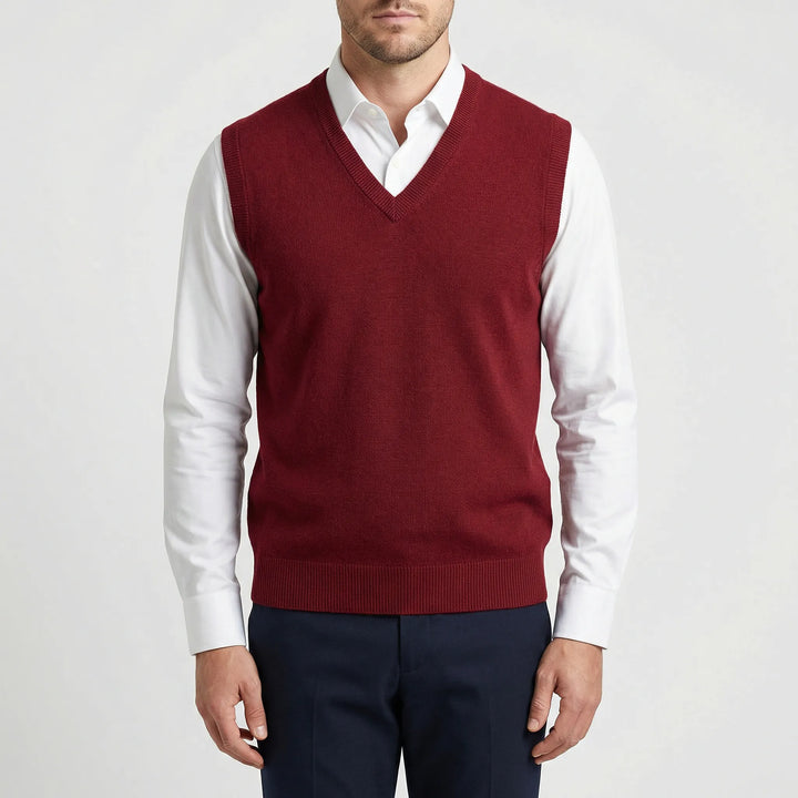 Man wearing a stylish Teo sleeveless V-neck vest, showcasing its classic fit and versatile menswear appeal.