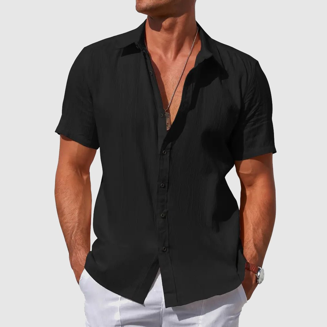 Relaxed fit men's button-front t-shirt with texture. Perfect short sleeve top for casual summer apparel.