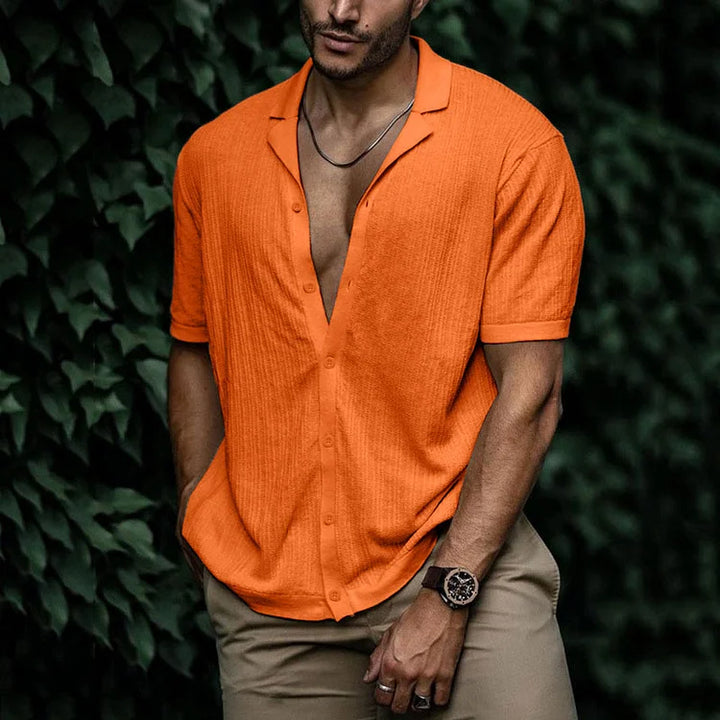 Back view: Men's relaxed fit textured summer shirt. Stylish Cuban collar, short sleeves, great for casual wear.