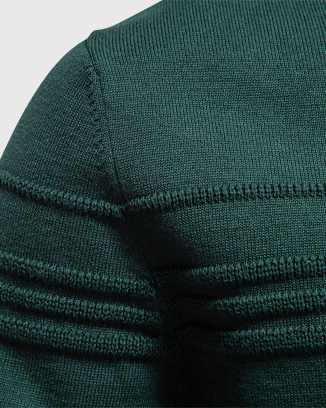 Side profile of a man in a relaxed fit textured crew neck sweater for everyday comfort