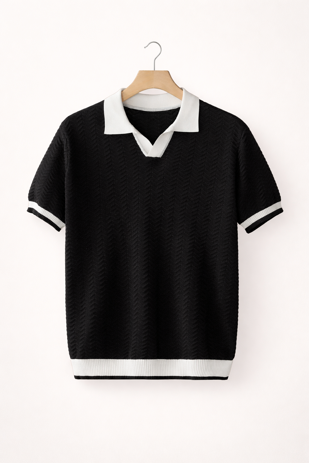 Stylish men's casual short sleeve polo shirt, textured knit, ideal for a modern summer or smart casual look.