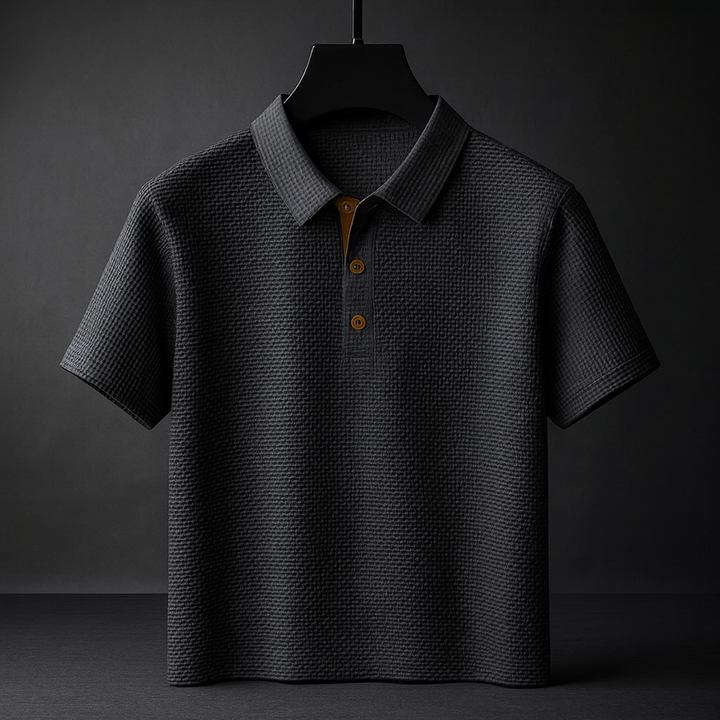 Close-up of a men's textured polo shirt, highlighting the fabric and tailored fit. A fashionable casual top for men.