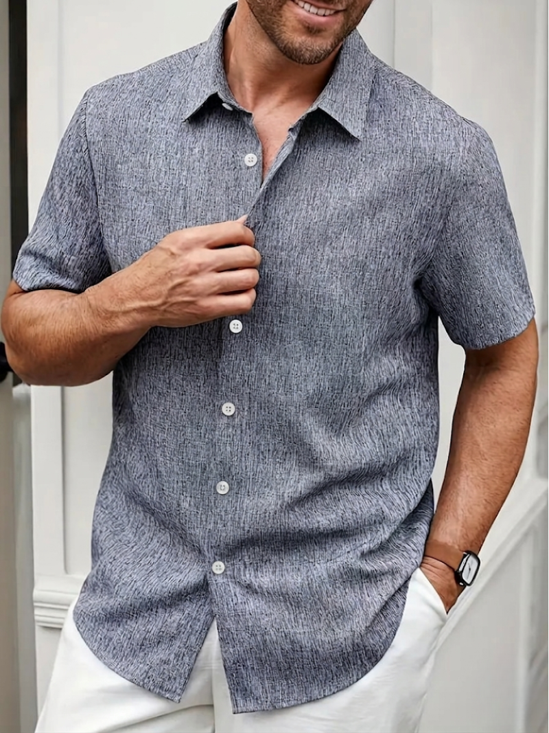 Stylish men's textured polo shirt, comfort regular fit, button-down for spring and everyday wear.