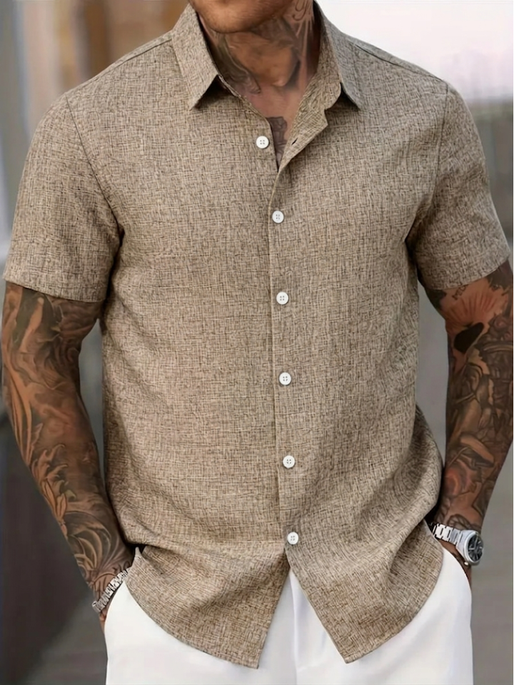 Regular fit men's textured polo shirt with button-down collar, perfect for casual fashion & comfort.