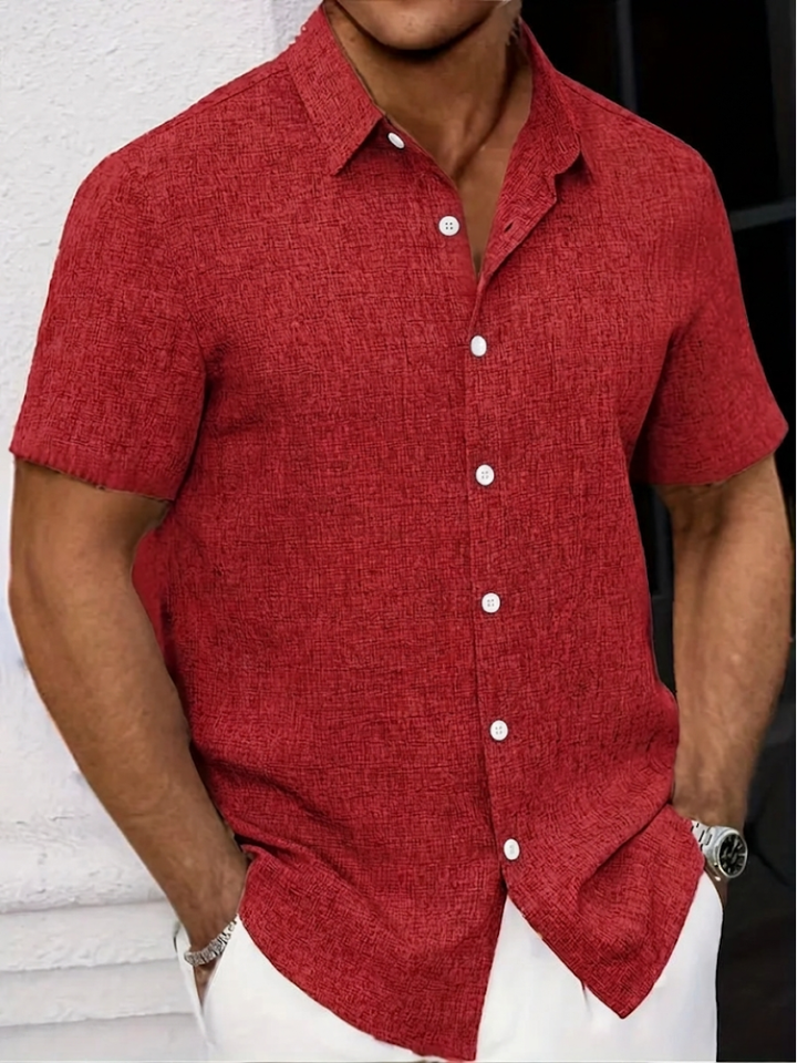 Short sleeve men's polo shirt, textured fabric, classic button-down style, regular fit for men's fashion.