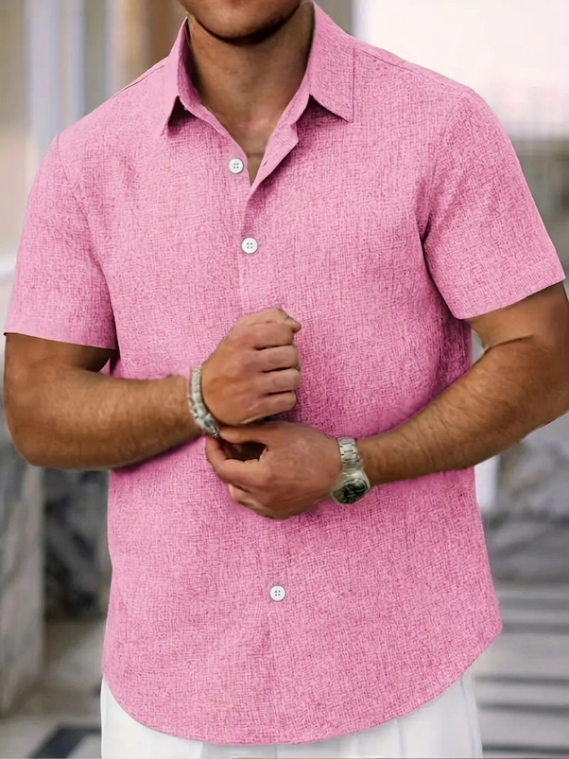 Comfort fit men's textured polo shirt, short sleeve & button-down, versatile for casual spring/summer style.