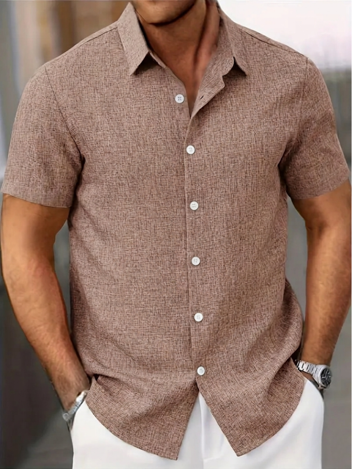 Textured men's polo shirt, regular fit, button-down, short sleeve; a comfortable summer top for men's style.