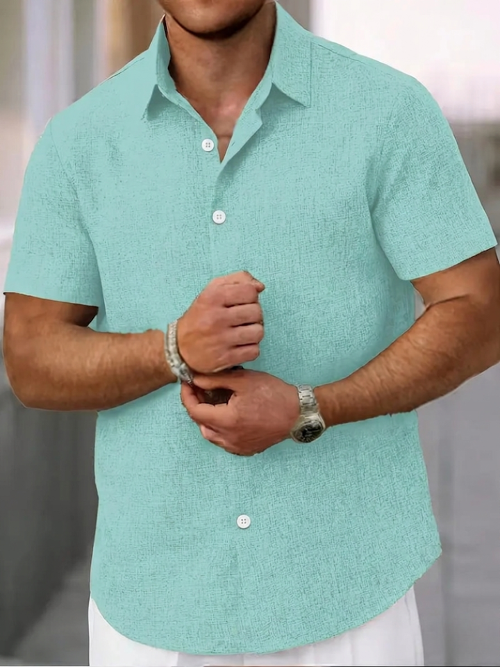 Casual men's textured polo shirt, regular fit, short sleeve, button-down; ideal for spring & summer everyday wear.