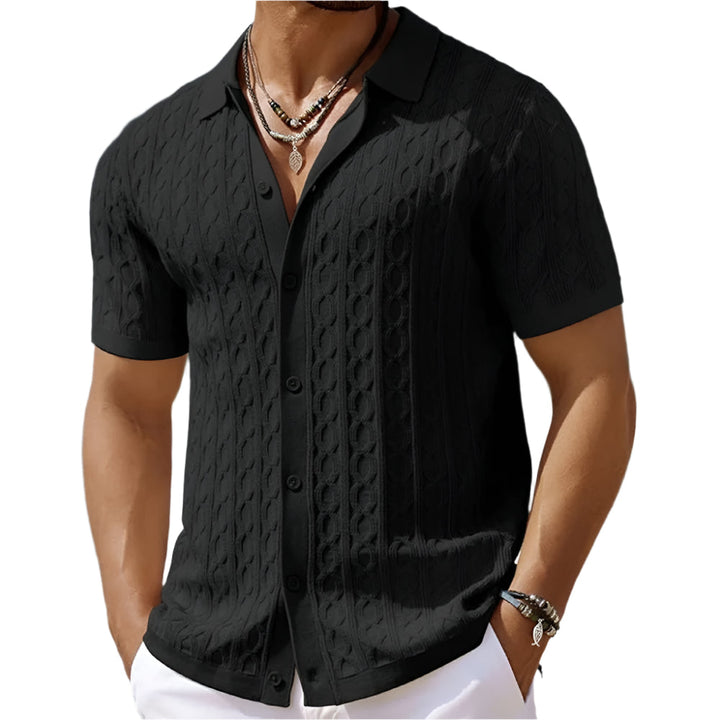 Close-up of a men's textured polo shirt, highlighting the unique fabric and button-down collar detail.