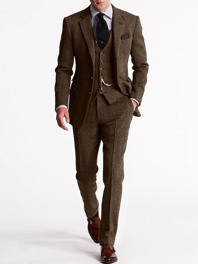 Full-length view of a men's tweed three-piece suit, perfect for spring fashion and classic gentlemen's wear.