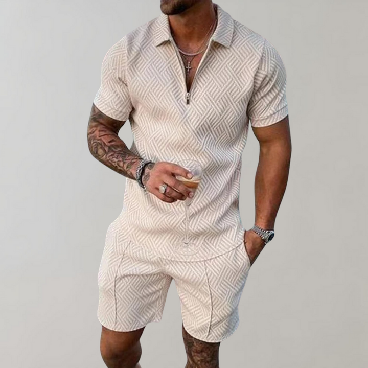 Lightweight men's two-piece summer set featuring a matching polo shirt and shorts. Comfortable fashion.