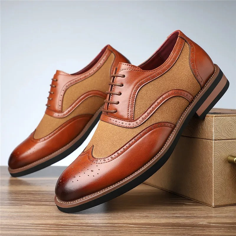 Front view of men's two-tone wingtip brogue oxfords, exhibiting quality craftsmanship