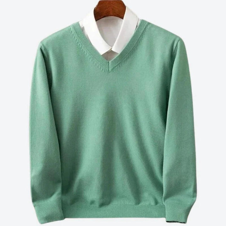 Stylish man modeling a versatile crew neck pullover sweater, perfect for men's classic fall and winter fashion.