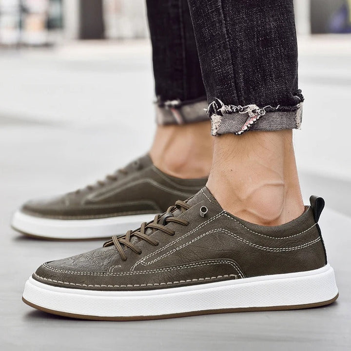 Urban Classic dark brown leather sneakers close-up, showcasing cowhide texture