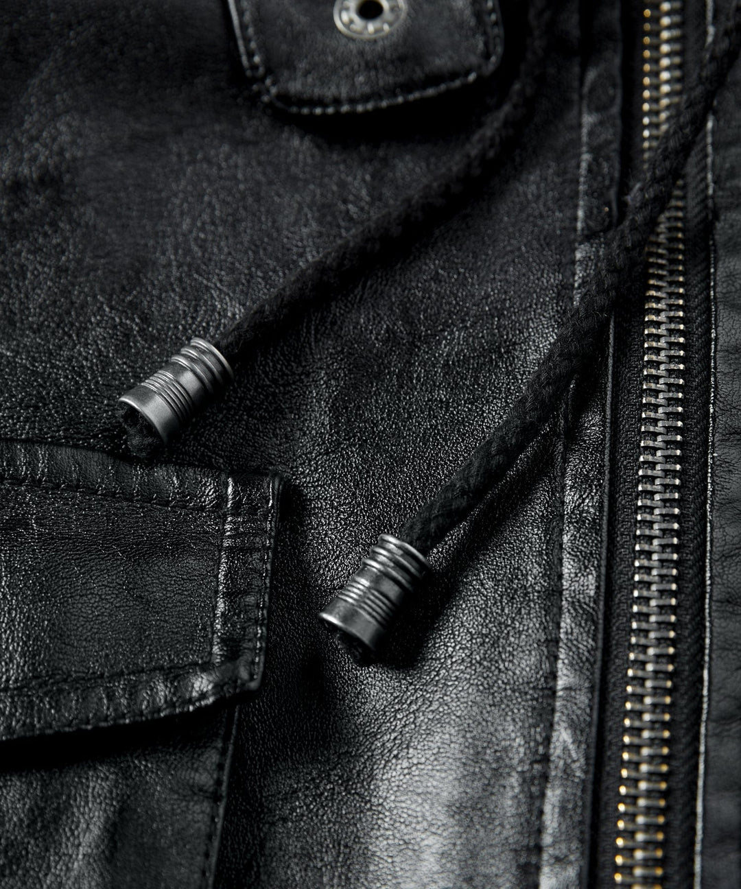 Side profile of the Men's Urban Edge Faux Leather Jacket, showing the sleeve cuffs and overall urban silhouette