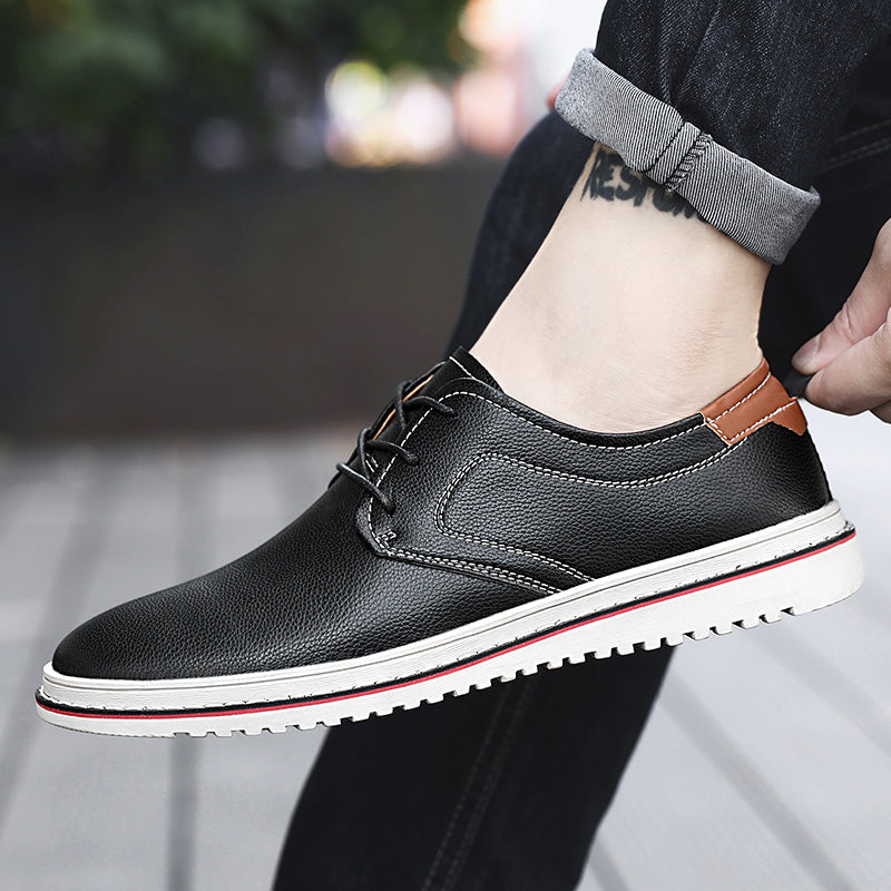 Sophisticated men's urban loafers, black, with sleek laces, ideal for an office look