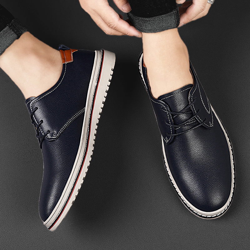 Men's fashion urban loafers, tan, highlighting the shoe's sleek silhouette and laces