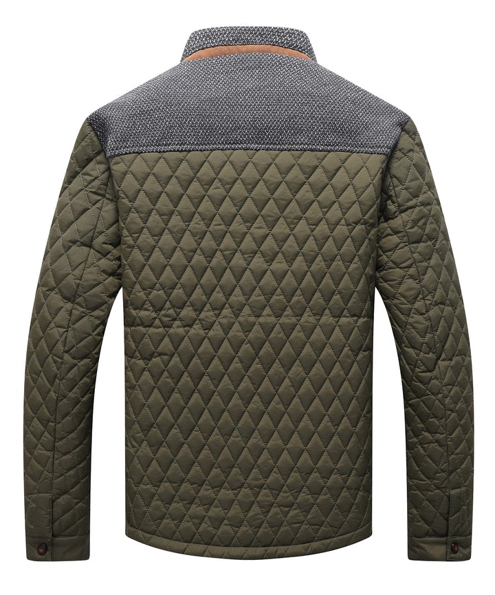 Men's performance outerwear in a neutral color, front view with hood up, ready for all weather