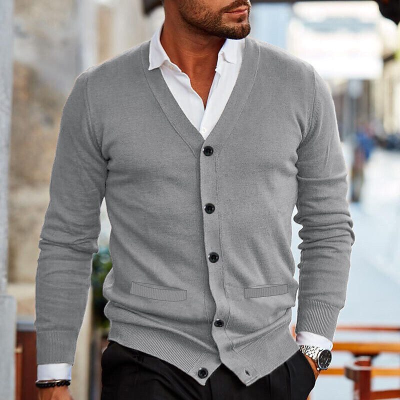 Stylish men's V-neck button-front cardigan in knitwear, great for autumn layering & business casual looks.