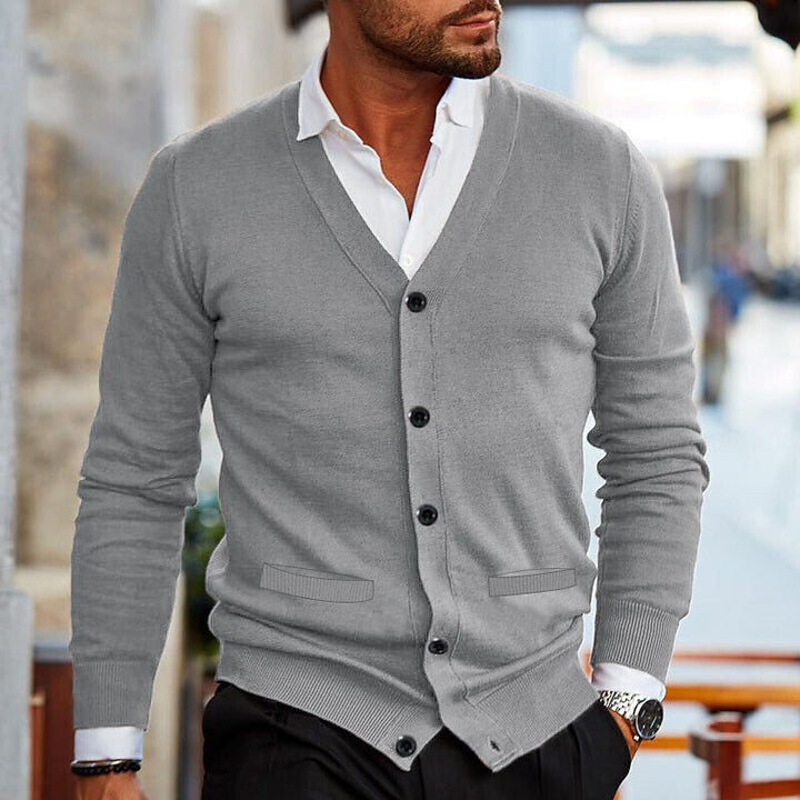 Stylish men's V-neck button-front cardigan in knitwear, great for autumn layering & business casual looks.