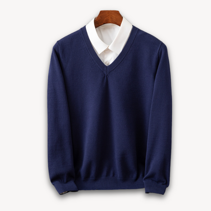 Trendy men's V-neck slim fit sweater, essential knitwear for contemporary fashion.