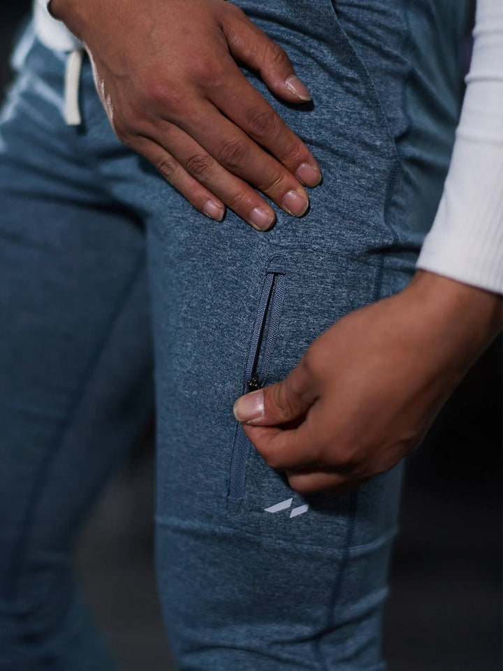 Athlete stretching in Men's Valencia Joggers, highlighting their stretch pants functionality