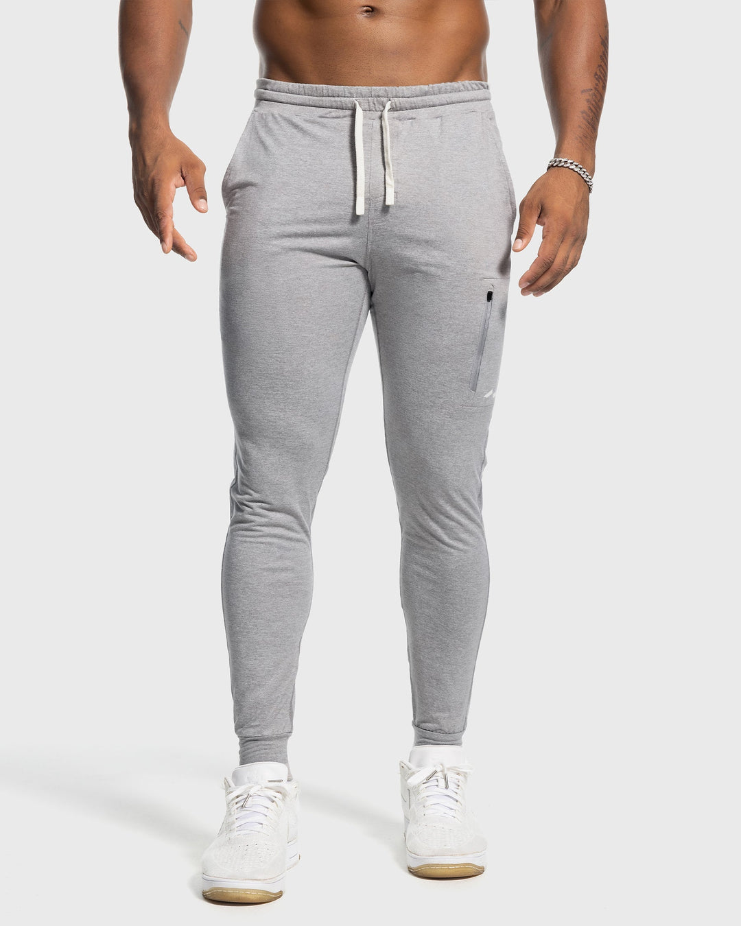 Men's Valencia Performance Joggers paired with sneakers, completing an athletic look