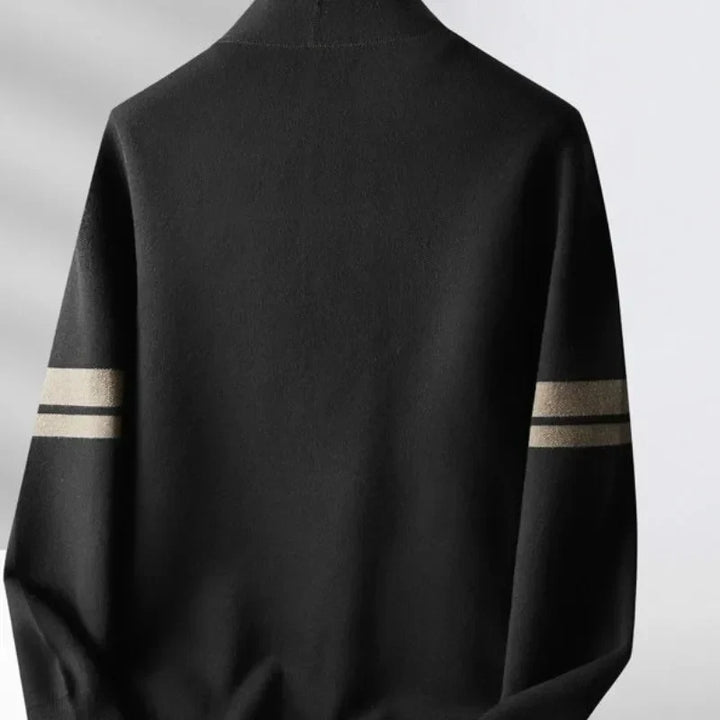 Close-up of men's Verona black and gray striped knit cardigan fabric and button detail