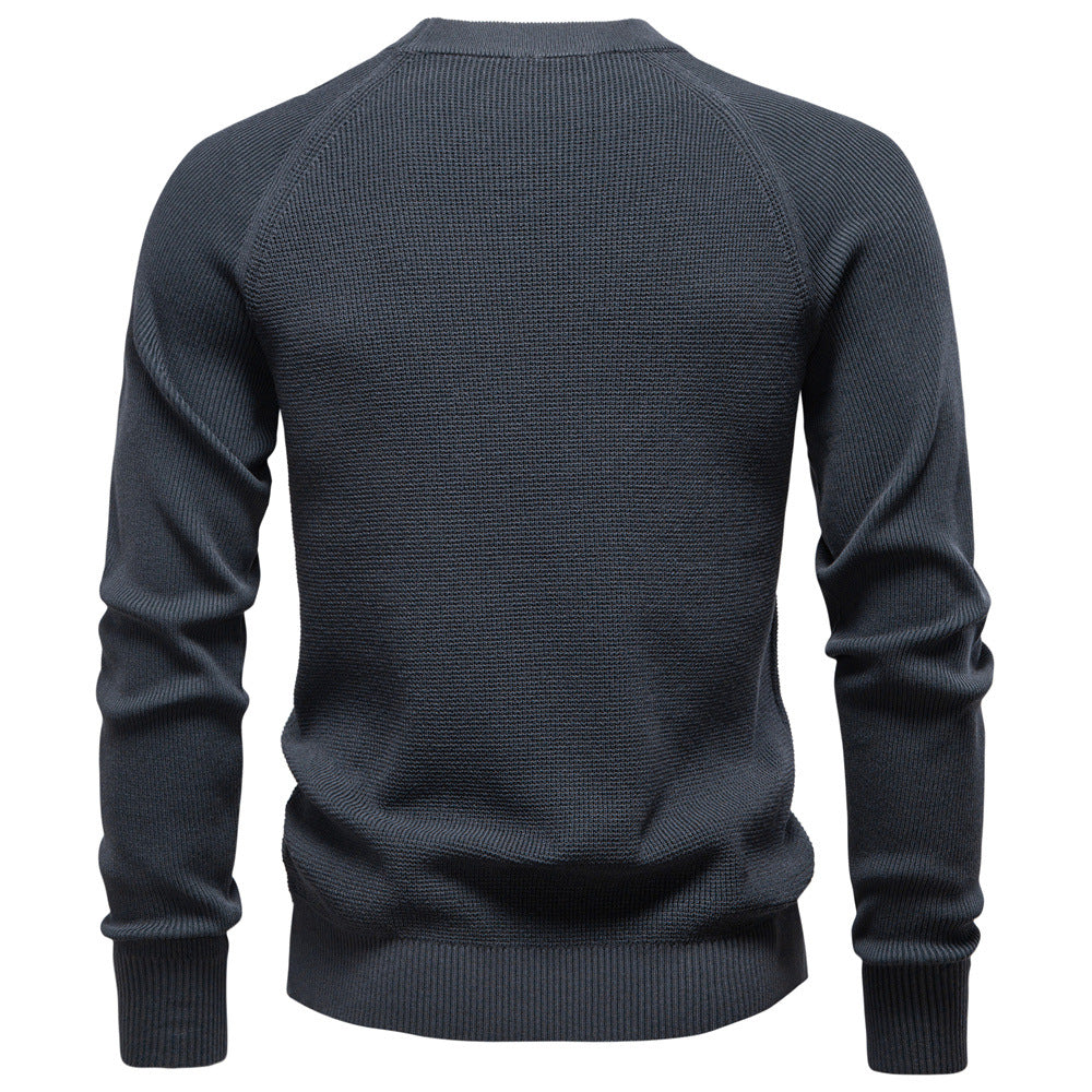 Men's waffle knit long sleeve pullover in a rich burgundy, a cozy winter fashion choice.