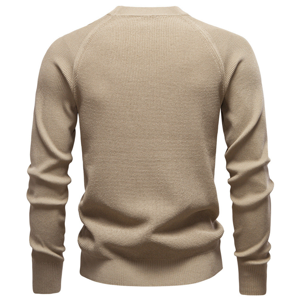 Men's black waffle knit pullover sweater, a timeless piece for any casual wardrobe.