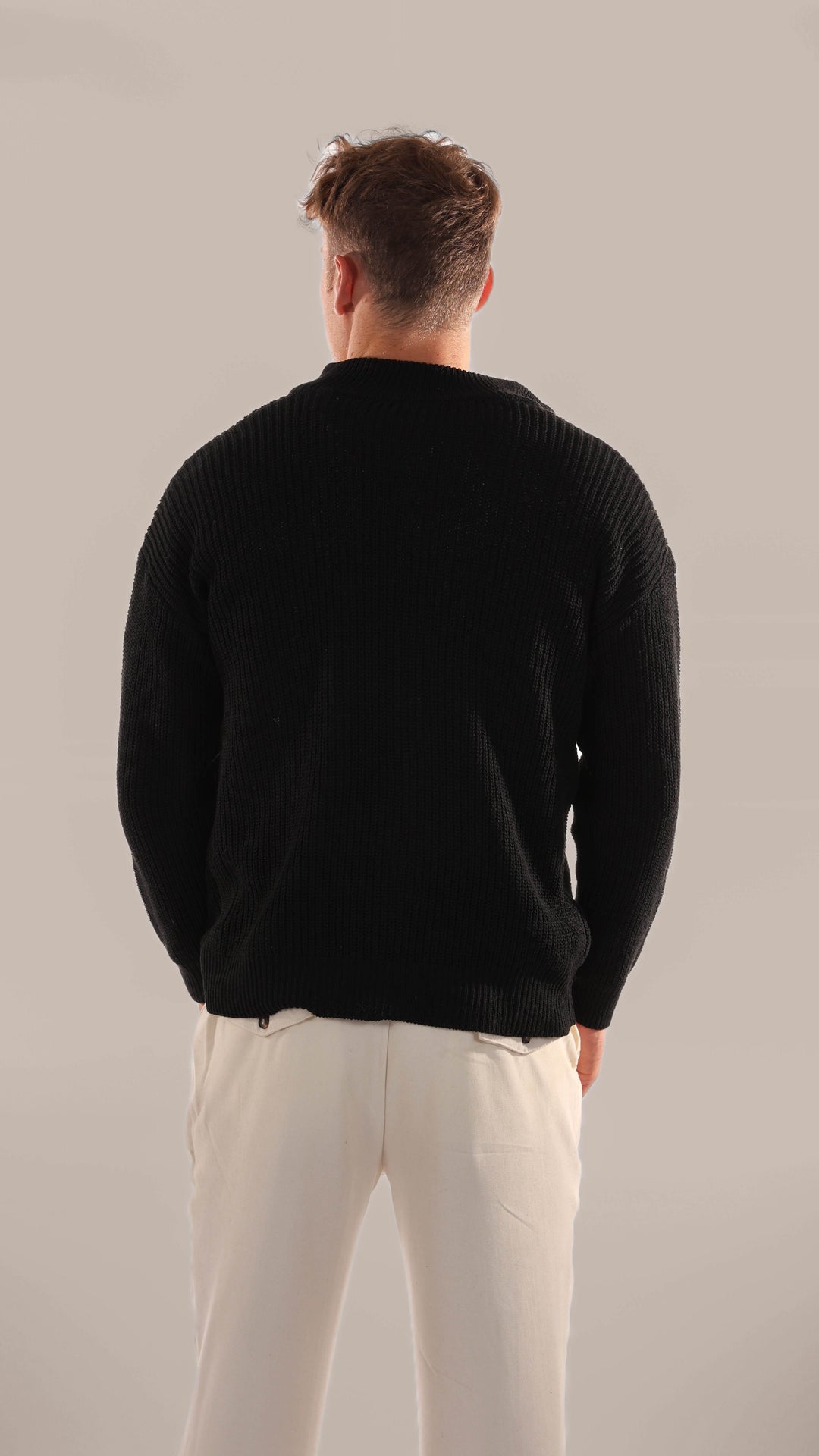 Stylish men's half-zip knitted sweater, ideal for smart casual layering during fall and winter seasons.