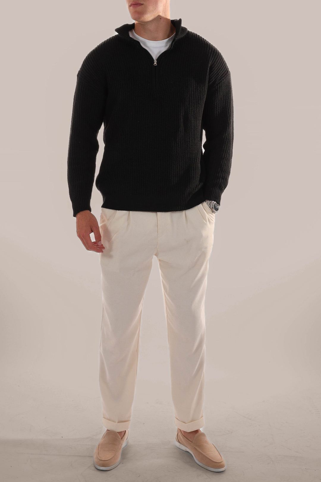 Men's versatile half-zip knitted jumper, a comfortable and stylish fall fashion essential for smart casual outfits.