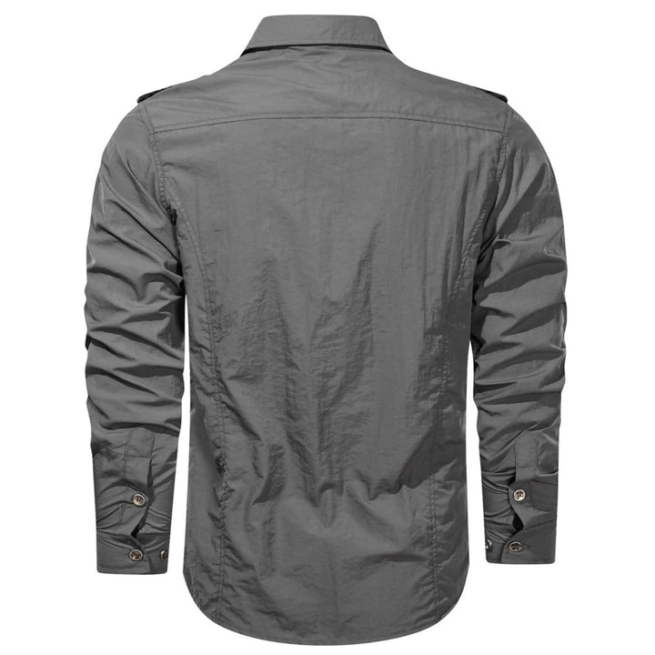 Side view of a man confidently wearing a men's soft shell shirt, showcasing its modern and functional aesthetic.